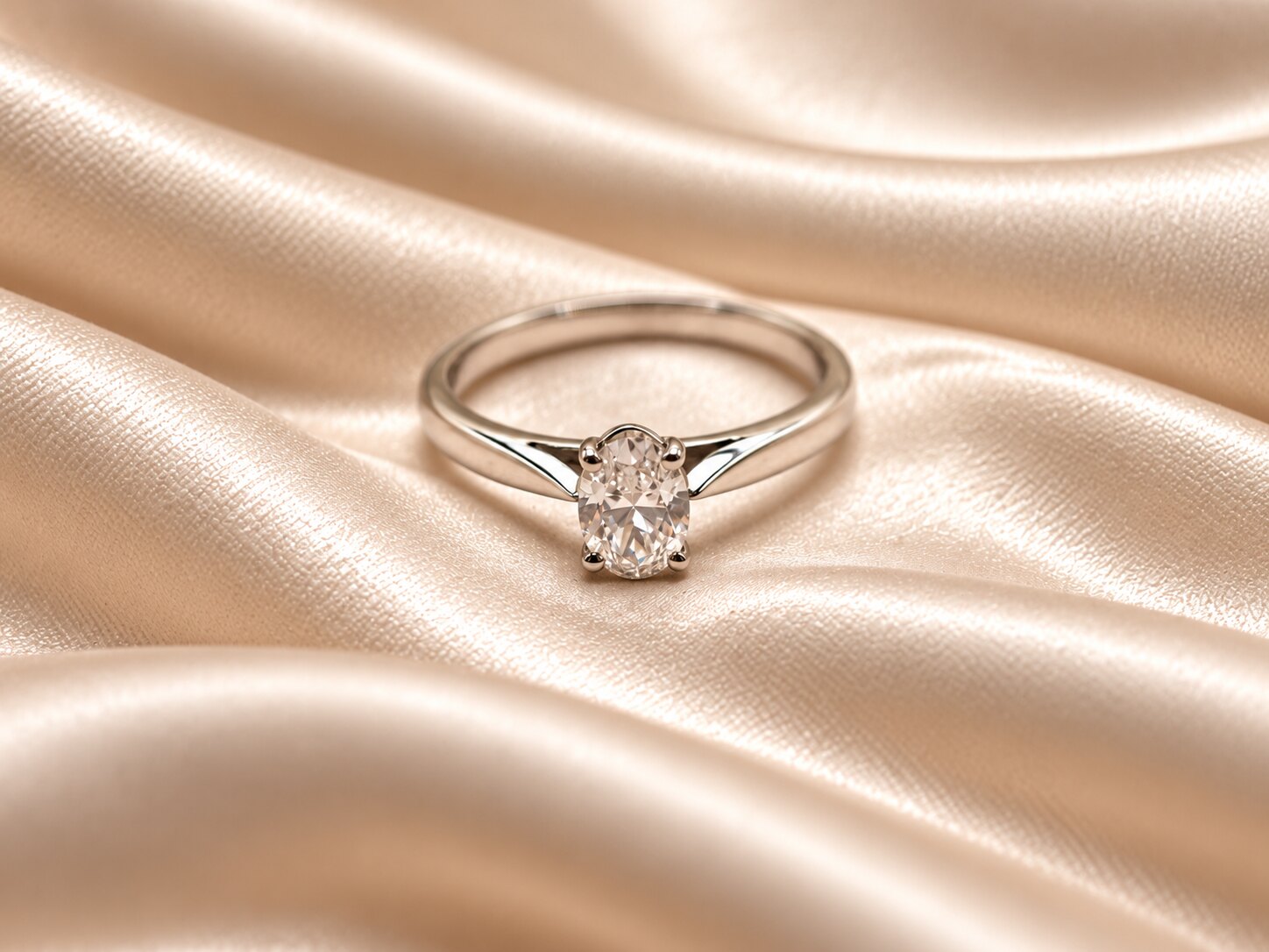 Platinum Four Claw Oval-Cut Diamond Ring