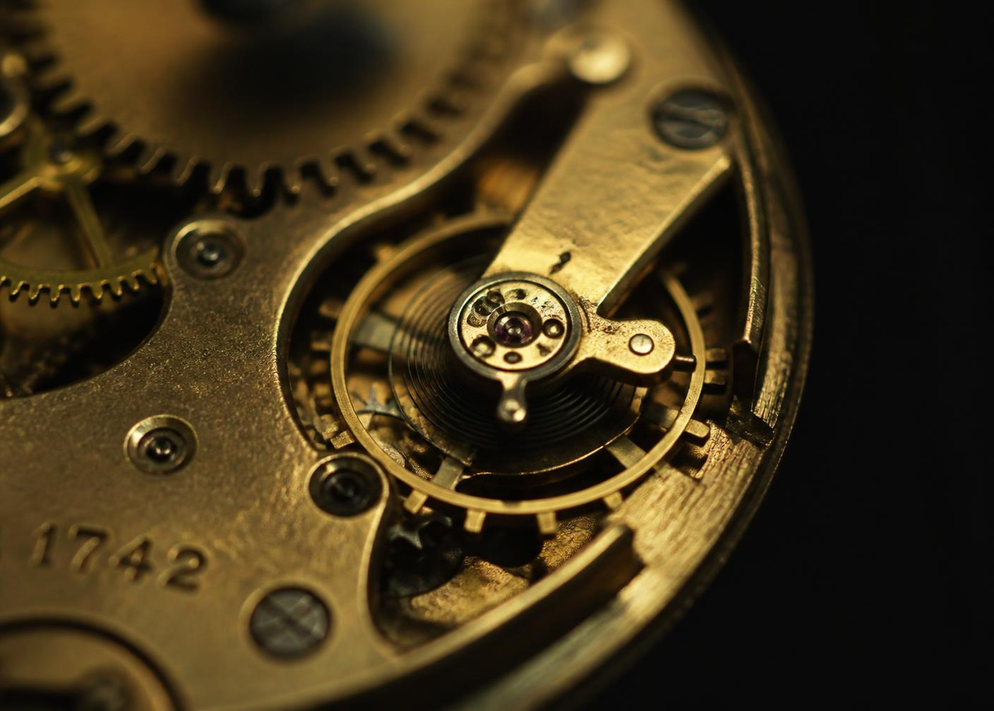 Macro detail of an antique clock movement